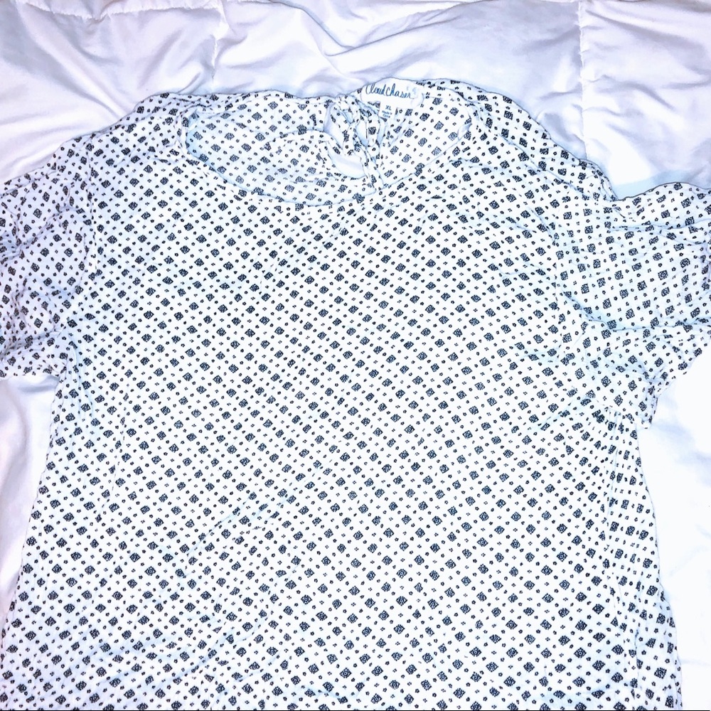 white and black designed blouse